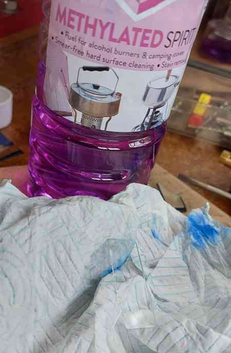 clean the glass with methylated spirits