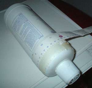 marking off a bottle for a dummy engine